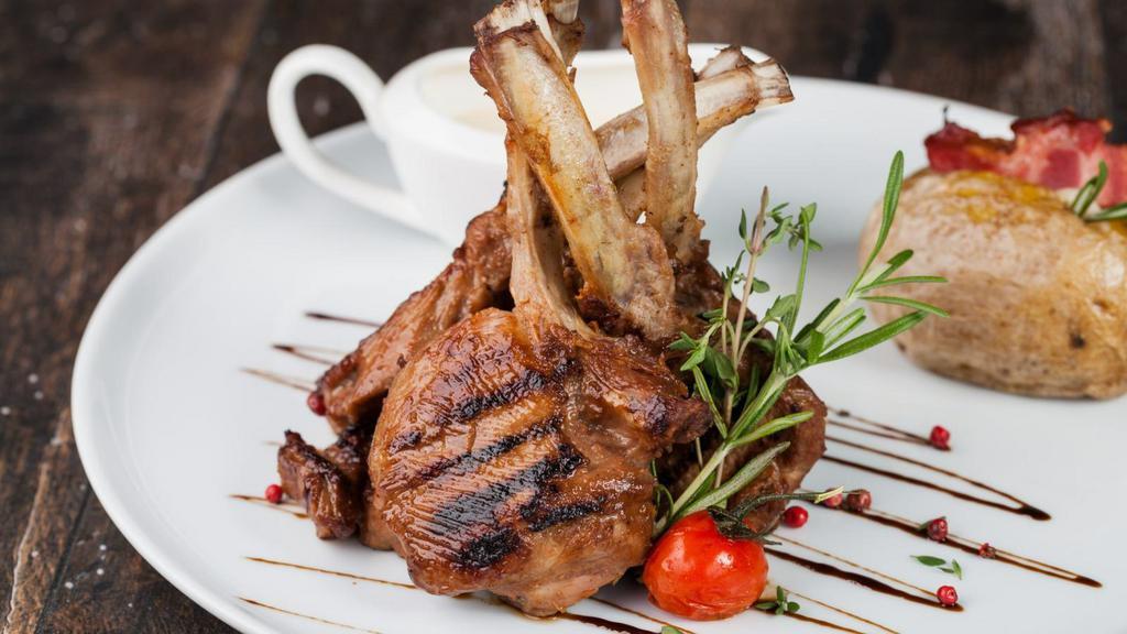 Lamb Chops · Freshly prepared rack of lamb, marinated in a select mixture of Indian spices, further broiled in tandoor clay oven.