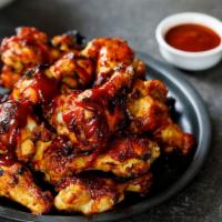 Tandoori Wings · Freshly prepared ten pieces of jumbo wings, marinated our special Indian spices, then cooked...