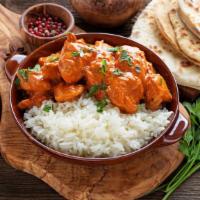 Chicken Curry Combo · Freshly prepared combination of chicken curry, with a side of naan, side of rice, and a 12 o...