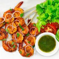 Tandoori Shrimp Tikka Combo · Freshly prepared combination of tandoori shrimp tikka, with a side of naan, side of rice, an...