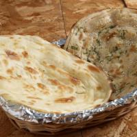 Lachha Paratha · Freshly prepared traditional multi layered, whole wheat bread, cooked in the clay oven.