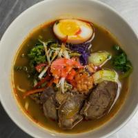 Kung-Fu Noodles · Hot & spicy. Hot and spicy broth, stewed beef shank, tea egg, scallion, baby bok choy.