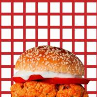 Sumo Crispy Chicken Burger  · Double crispy chicken, mayo, buffalo sauce, lettuce, tomato, onion, and American cheese.