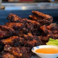 Mesquite Wings · Bone-in or boneless, mesquite-marinated chicken wings: Dry rub-seasoned with 11 herbs and sp...