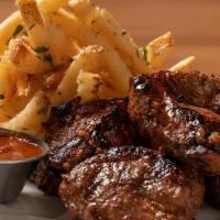 Josper Steak Tips · 3/4 pound of coal-fired tips of beef cut & marinated in-house, broccoli, french fries , hous...
