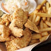 Chicken Tenders · Hand-breaded chicken tenders, honey mustard sauce served with French fries.