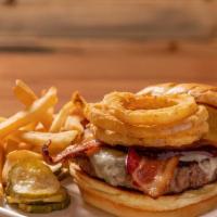 The Bbq Burger · Applewood smoked bacon, Vermont cheddar, onion strings, honey bbq sauce on a toasted bun.