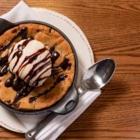 Skillet Cookie · giant chocolate chip cookie, vanilla ice cream, chocolate sauce