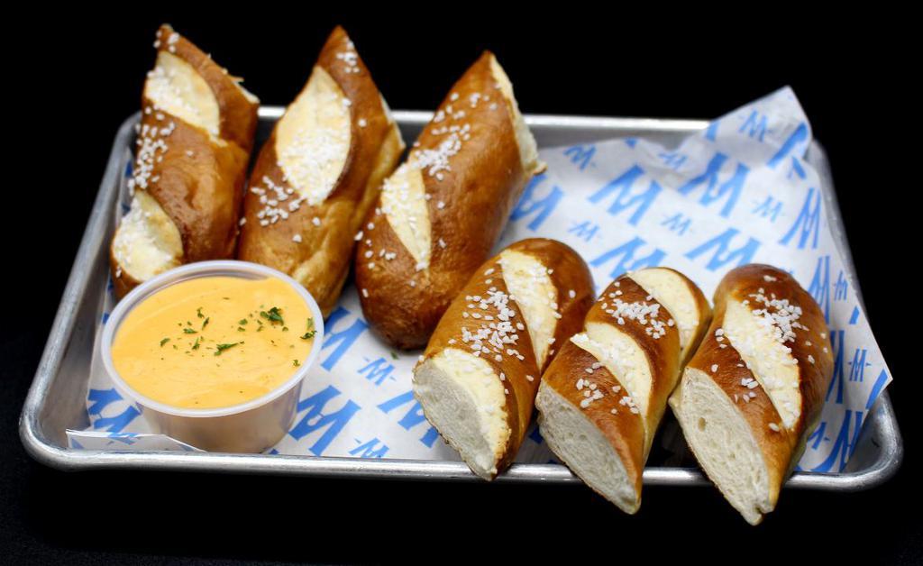 Totem Pole Pretzels · 6 pcs of Hand-Cut oven Fresh Pretzels served with a Warm Beer Cheese