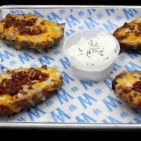 Potato Skins · 4 Large Potato Halves that are Loaded with Cheddar and Bacon served with Sour Cream