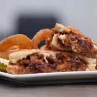 Pulled Pork Grilled Cheese · BBQ Pulled Pork loaded with American Cheese served on your choice of White or Wheat Bread