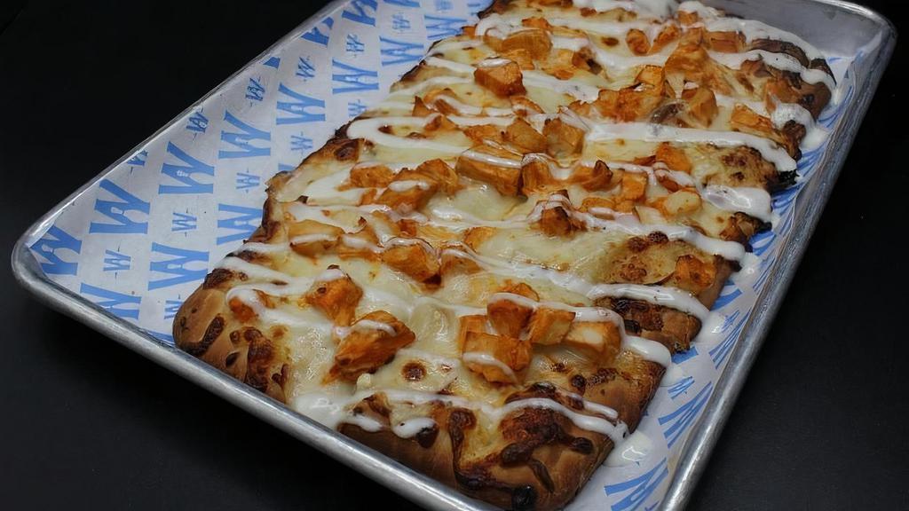 Buffalo Soldier Flatbread · Buffalo Chicken, 3 Cheese Blend with a Bleu Cheese base with a Ranch Drizzle on Top