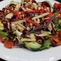 Bbq Chicken Salad · Romaine Lettuce, Diced Chicken, Shredded Cheese, Tomato, Onion, Black Beans, and Corn.  Topp...