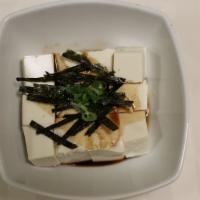 Cold Tofu · Served with soy sauce, scallions, sesame seed and dried seaweed.