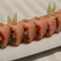 Pink Lady Maki · Top: grilled salmon, tobiko, cream cheese, asparagus and avocado. Inside: pink soy paper wit...