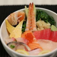 Chirashi (12 Pieces) · Sashimi over rice: tuna two pieces, salmon one piece, yellowtail one piece, tilapia two piec...