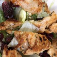 Cranberry Walnut Salad · Grilled chicken breast on mixed greens with Canadian walnut, dried cranberries and crumbled ...