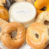 One Dozen Bagel Tray · 12 Bagels sliced and quartered. Please choose 12 bagels. Includes 1 (8 oz.) plain cream chee...