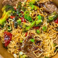 Mongolian Beef Stir-Fry · Seared tenderloin medallions, broccoli, Peppadew and poblano peppers, sesame seeds, garlic, ...