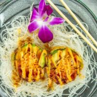Monkey Brain · Avocado stuffed with crab meat and spicy tuna, deep fried and topped with eel and spicy sauce