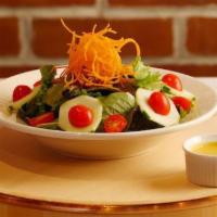 House Salad · Romaine lettuce, carrots, cucumber and tomato (ginger dressing or balsamic with olive oil).