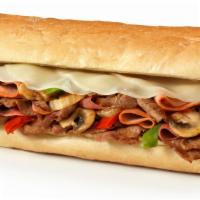 Steak Bomb · Freshly Grilled Sirloin Steak, Genoa Salami, Hot Capicola, Grilled Onions, Bell Peppers and ...