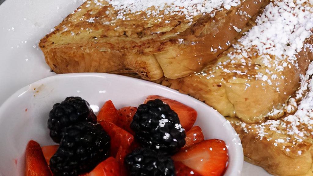 French Toast · Comes with powdered sugar, cinnamon and butter.