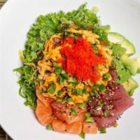 California Poke Bowl · Salmon*, spicy tuna*, seaweed salad, masago*, avocado, cilantro.