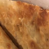Scallion Pancake · Savory folded flatbread.