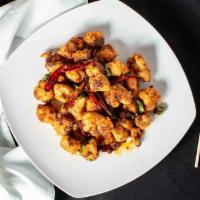 Szechuan Dry Pepper Chicken · Spicy. Crispy diced chicken with hot red pepper and hot spicy szechuan seasonings.