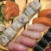 Party Boat · Nine pieces sashimi, ten pieces nigiri sushi, sake maki, and California maki.