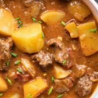 Carne Guisada Con Papas · Beef stew with potatoes.