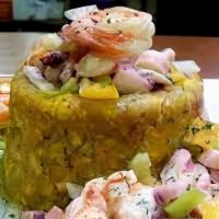 Mofongo De Marisco · Mashed baked plantain with seafood.