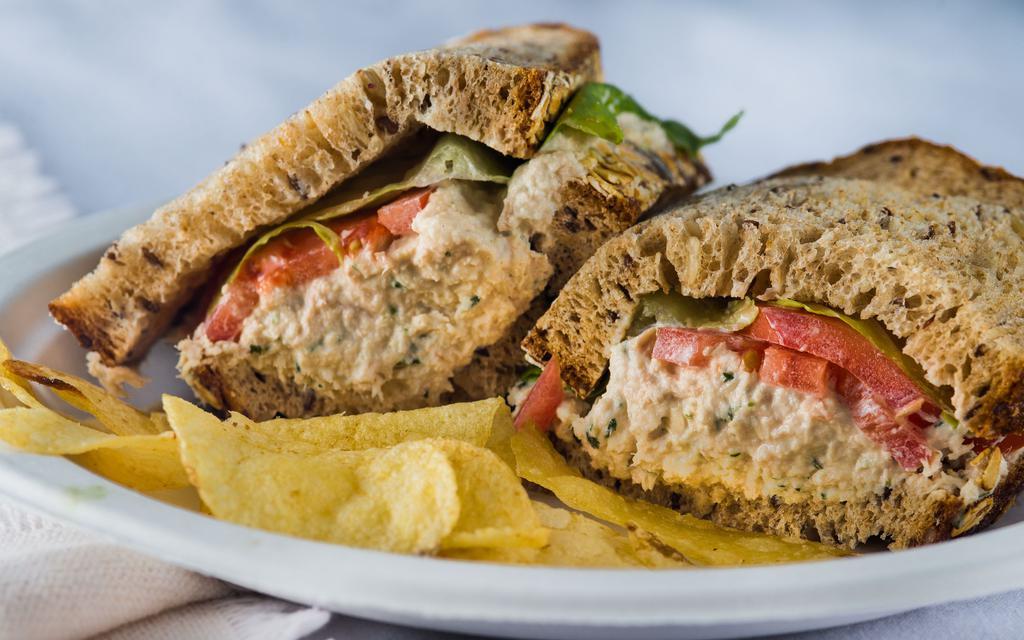 Tuna Salad · Our classic recipe served with mayonnaise, romaine & tomatoes on sliced multigrain.