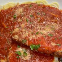 Chicken Parmigiana · Topped with Mozzarella and fresh tomato sauce. All entrées are served with pasta or baked po...