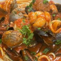 Seafood Fra Diavolo · Clams, mussels, shrimp, scallops and calamari in a spicy marinara sauce over pasta. Served w...