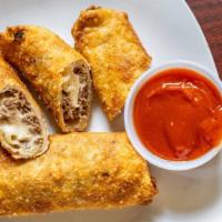 Cheese Steak Egg Roll · Three pieces. Three cripsy egg roll stuff with steak, American cheese. Served with ketchup s...