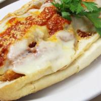 Chicken Cutlet Parmigiana · Tomato sauce, provolone and romano cheese.