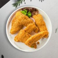 Classic Tenders · Six pieces chicken tenders breaded and fried until golden brown, served with fries and a can...