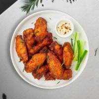 Classic Wings · Six pieces chicken wings breaded and fried until golden brown, served with fries and a can o...