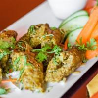 Lamb Seekh Kebab Awadhi · Minced lamb kabobs coated in toasted bell peppers.
