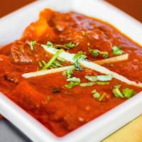 Lamb Vindaloo · Tangy and spicy goan-style curry with potato.
