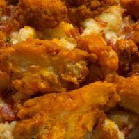 Buffalo Mac · Rich and creamy white cheddar baked Mac 'n Cheese topped with Buttered Cracker Crumbs, Bonel...