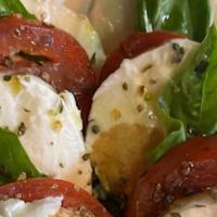 Caprese Salad · Fresh Mozzarella, EVOO, Basil and Balsamic Reduction, Italian spice