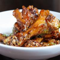 Duck Wings · With sambal honey and lime.