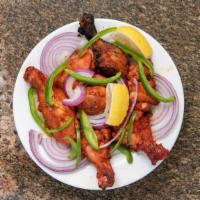 Clay Oven/Tandoori Chicken · Chicken broiled in F special sauce.