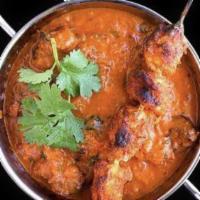 Shrimp Tikka Masala · Shrimp cooked in tomatoes and cream souse.