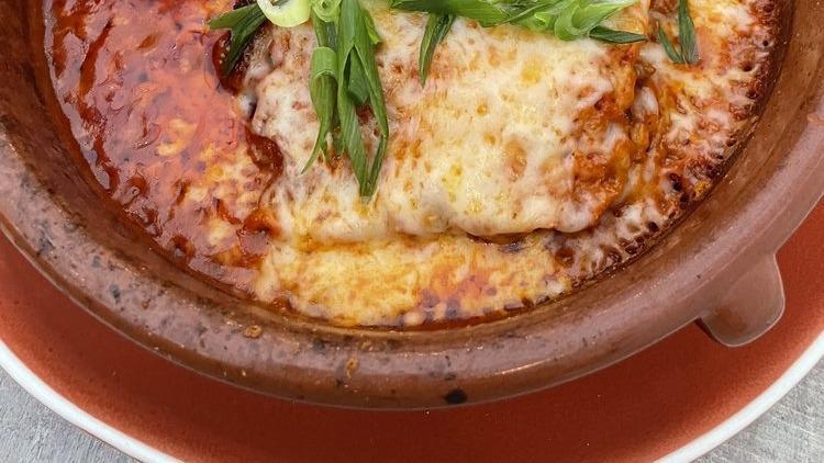 Lasagna Di Carne  · Sheets of lasagna layered with braised sirloin, Ricotta, Mozzarella, Parmiggiano and tomato sauce.