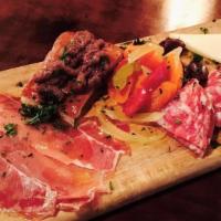 Piccolo Antipasto Di Salumi · Italian cured meats with marinated roasted peppers, cannelini beans, olives, and pecorino ch...