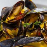 Cozze Alla Parigina · PEI mussels simmered with garlic, butter, white wine, and fresh basil, served with garlic cr...